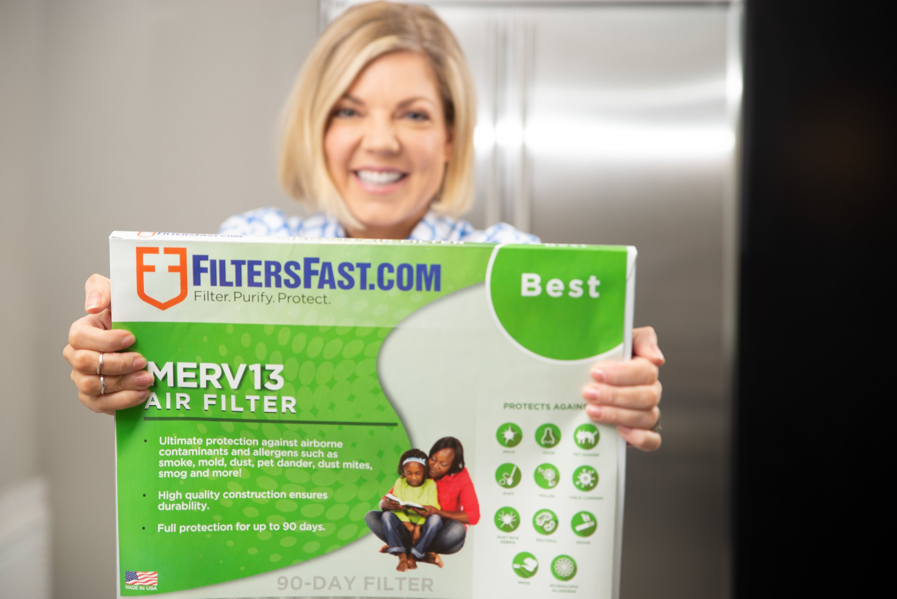 woman holding filtersfast brand air filter